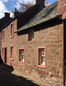 A small cement pointed cottage in Kirriemuir